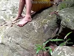 Buddy fucks busty aunt in jungle pond amid public bathers