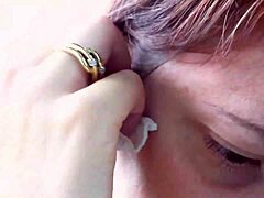 Nicoletta's earring play and tease