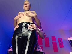 Latex-clad drag queen indulges BDSM