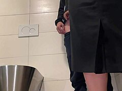 Public bathroom tryst with mature babe