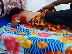 Green saree-clad housewife enjoys sex