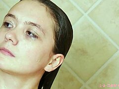 Beautiful brunette's steamy shower scene