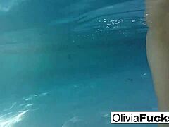 Olivia swims alone in pool