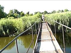 Beach babe on hanging bridge