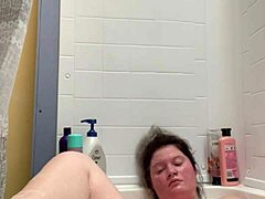 Dirty mom showers with her son